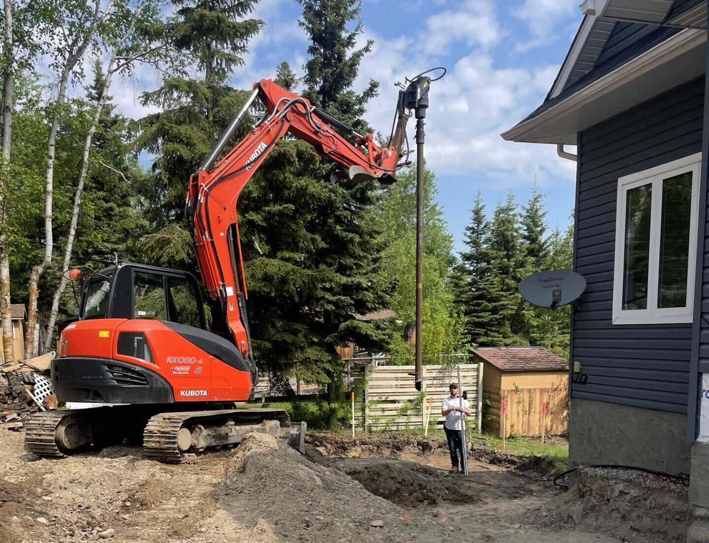 Hydraulic drilling machine is boring holes in the construction site for bored piles work. Bored piles are reinforced concrete elements cast into drilled holes, also known as replacement piles.